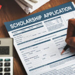 Applicant filling out a scholarship application.